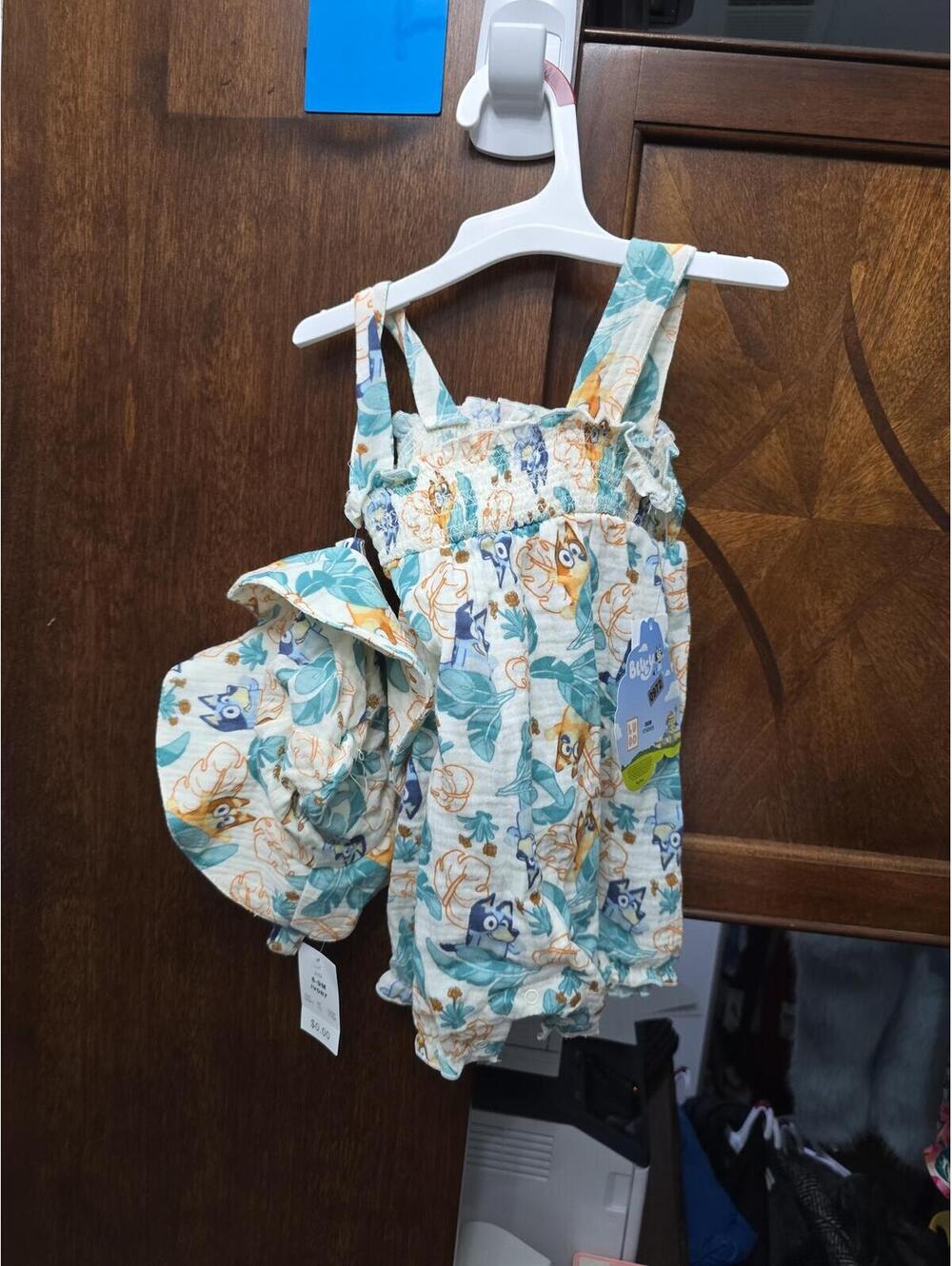 6 to 9m brandon's brand new disney bluey romper, with hat.Item 972